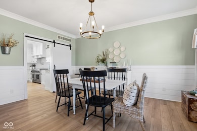 Shiplap Dining Room w/ Barn Door to Kitchen