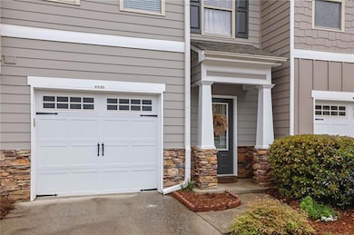 Entrance to property with board and batten siding,