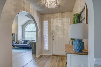 Entry to home with office or second living room of