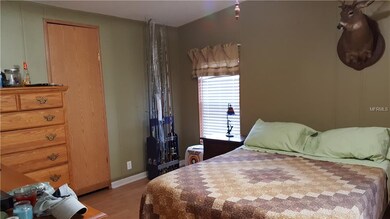 Master bedroom with large walk-in closet.