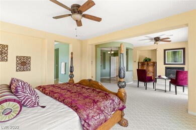 Primary Bedroom with Seating Area & Fireplace