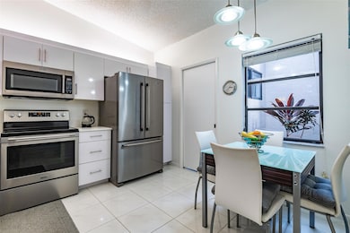 8077 Whispering Palm Dr unit 1, Boca Raton, FL 33496 - photo 4