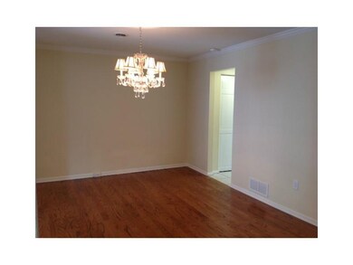 Dining Room. Hardwood Floors & Crystal Chandelier!