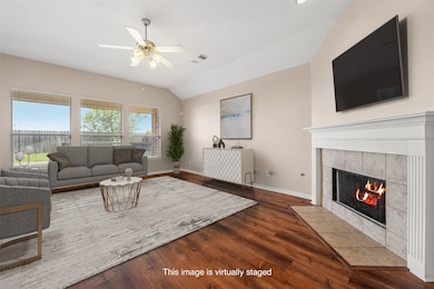 Open floor plan with new flooring and paint in the