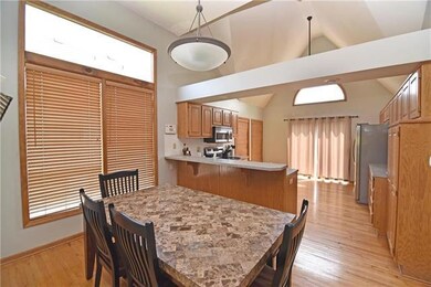 Large kitchen with stainless appliances, and enoug