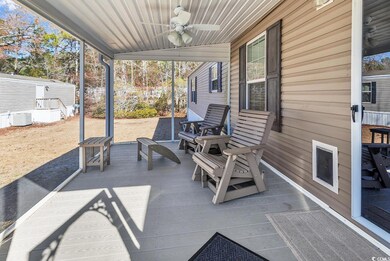 View of patio featuring ceiling fan