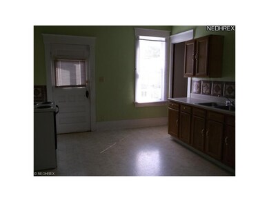 Kitchen flooring, cupboards and counter/sink withi