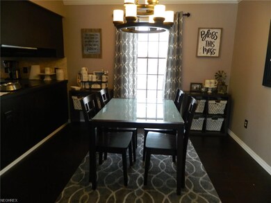 Formal Dining Room w/laminate floor & open flow to