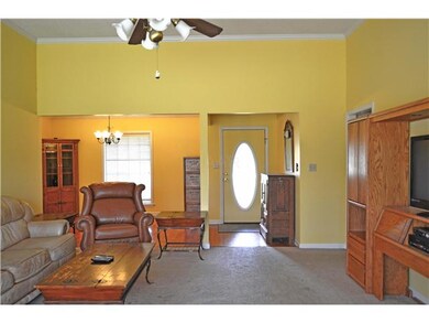 YET ANOTHER VIEW, LOOKING AT THE FRONT DOOR AND IN