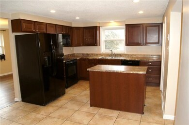 Spacious, updated eat in kitchen with recessed lig