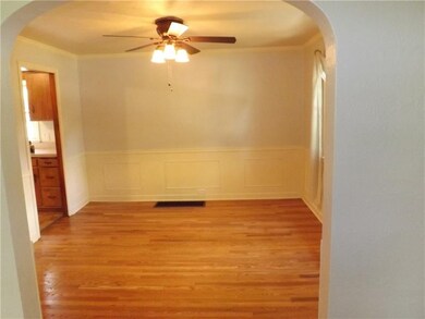 Dining room with ceiling fan, wainscoating - fresh