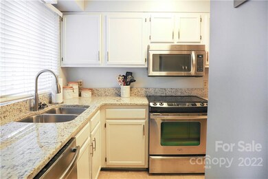 Granite countertops and stainless steel appliances