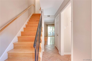 Foyer has ceramic tile floor and newly refinished