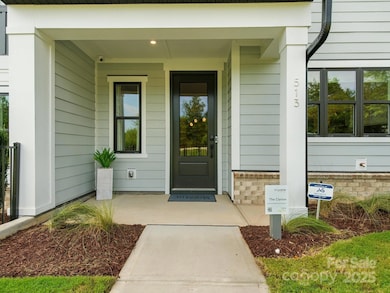 Covered Front Entry and Charming Front Porch. *Model Photos | Actual Finishes, Structural Selections, and Orientation May Vary.