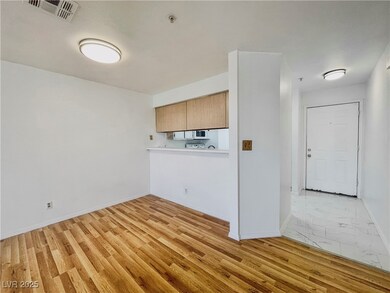 Entry front door to the home leads into the Kitchen and Dining Area.
