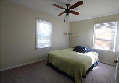 Bedroom #1 another view - there is hardwood under the carpet according to the owner of the property