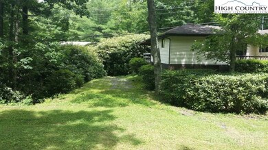 RV parking: Large RV parking area next to cottage.