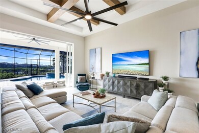Tiled living room featuring beamed ceiling, ceilin