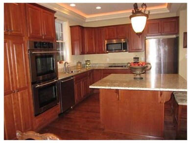 Kitchen. Gourmet cherry stained kitchen with large