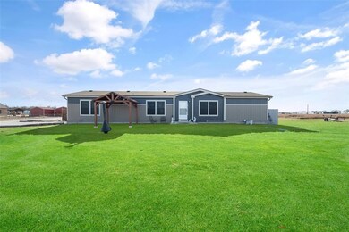 Front of home with Pergula