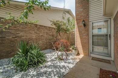 Freshly landscaped courtyard welcomes you as you enter this adorable home!