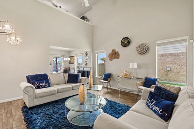 The living area is filled with natural light, thanks to its numerous windows, creating a bright and inviting space.