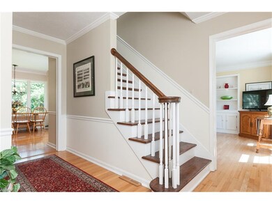 Welcoming Foyer with Hardwood Floor