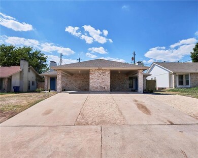 View of front of property featuring concrete driv