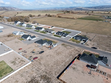 Aerial view of residential area with a mountain backdrop
