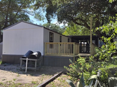 Rear view of property with a deck