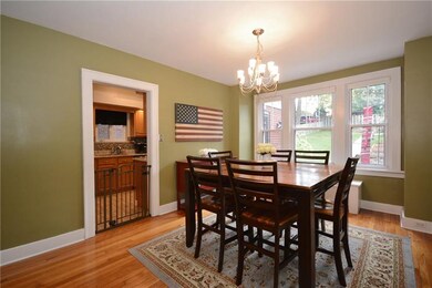 Spacious dining room looks into the backyard.