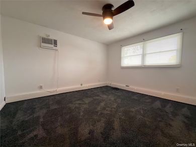 unlisted-address, Farmingdale, NY 11735 - photo 5