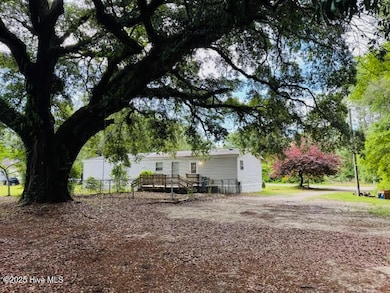REAR EXTERIOR AND REAR YARD