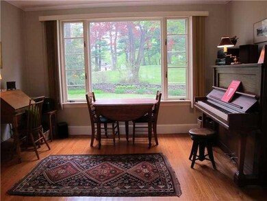 Living Room. Large windows let in...