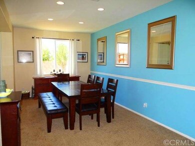 Formal dining room with custom paint and chair rai