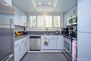 Clean, modern kitchen in cool tones.