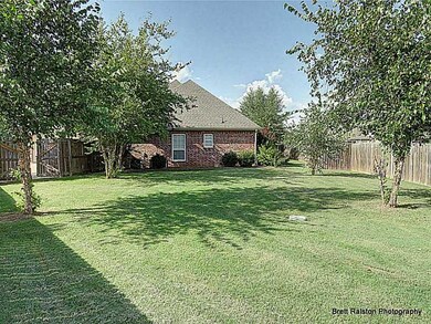 Yard/Garden. Large backyard surrounded by wooden p