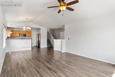 View of the family room into the kitchen.