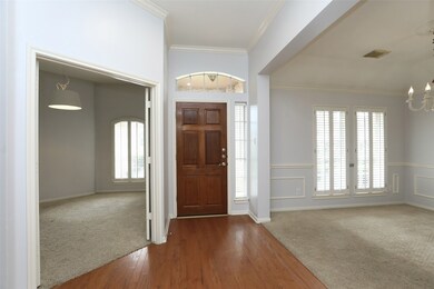 Lovely plantation shutters in both the formal dining room and the study off the front hall. Real wood flooring in the main living areas.
