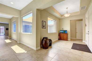 This fabulous entry features tile flooring, vaulte