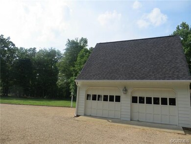 2 Car Garage w/ Worship Area & Walk Up Storage