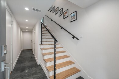This 1st floor foyer has a door leading to the gar