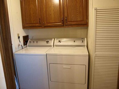 Other. Laundry area with washer/dryer and a corner