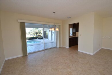 Formal dining room leads into kitchen