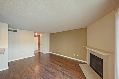 This living area is a large space with a comfortab
