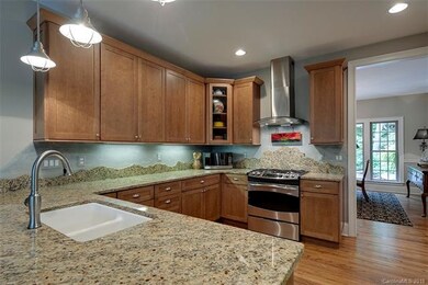 Kitchen with granite countertops, stainless applia