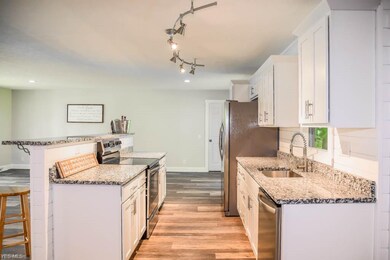 Brand new kitchen with new cabinets and granite co