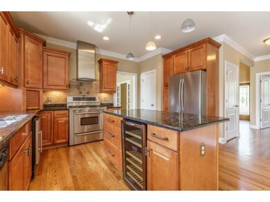 Wine fridge island gas range