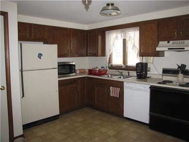 Kitchen. Eat in kitchen offers wood cabinets,new d