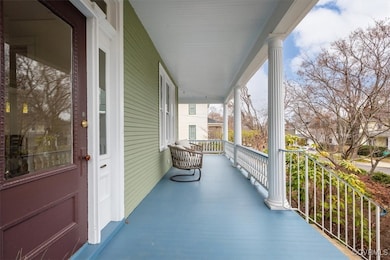 Balcony featuring covered porch